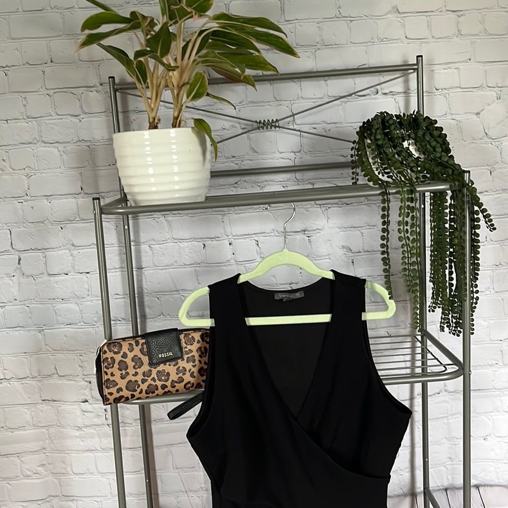 Size M - low cut black dress perfect for date night!! And also a FOSSIL clutch